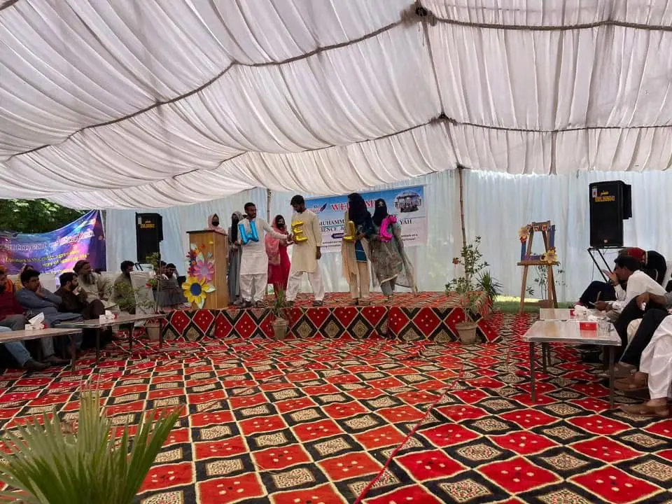 Students gathered in the campus marquee
